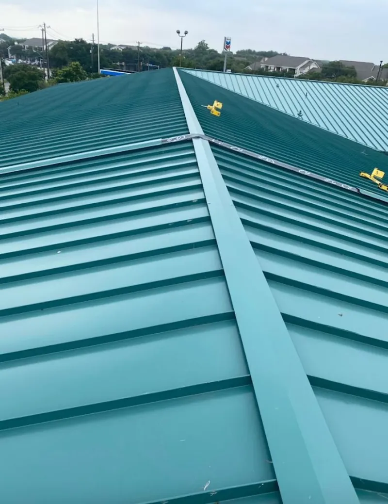Green commercial metal roof ridge and valley for Metal Roof Repair in Lee's Summit