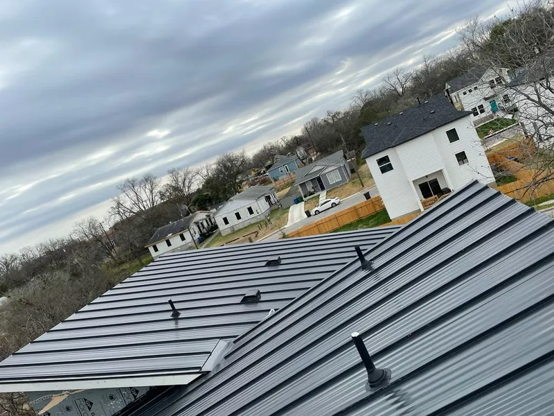 Standing seam metal roof panels with vents for Skylight Repair in Lee's Summit
